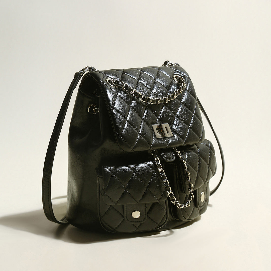 multi-pocket-chainstrap-quilted-backpack_black_2.jpg