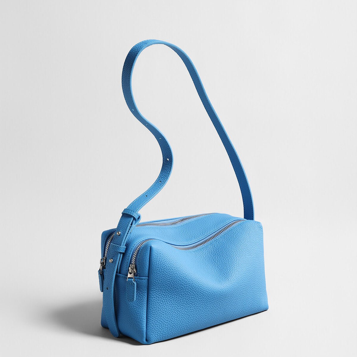 Pebbled Calfskin Bowling Bag – Structured Wave-Zip Shoulder Crossbody