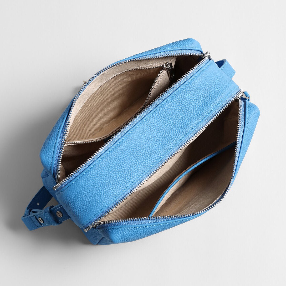 Pebbled Calfskin Bowling Bag – Structured Wave-Zip Shoulder Crossbody
