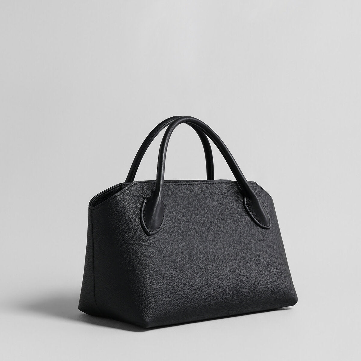 Pebbled Leather Structured Bowling Bag – Curved-Top Zip Satchel with Rolled Top Handles