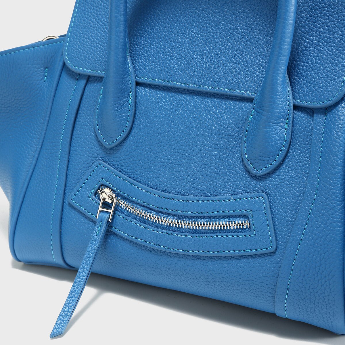 Pebbled Leather Winged Top-Handle Bag – Structured Mini Tote with Crossbody Strap