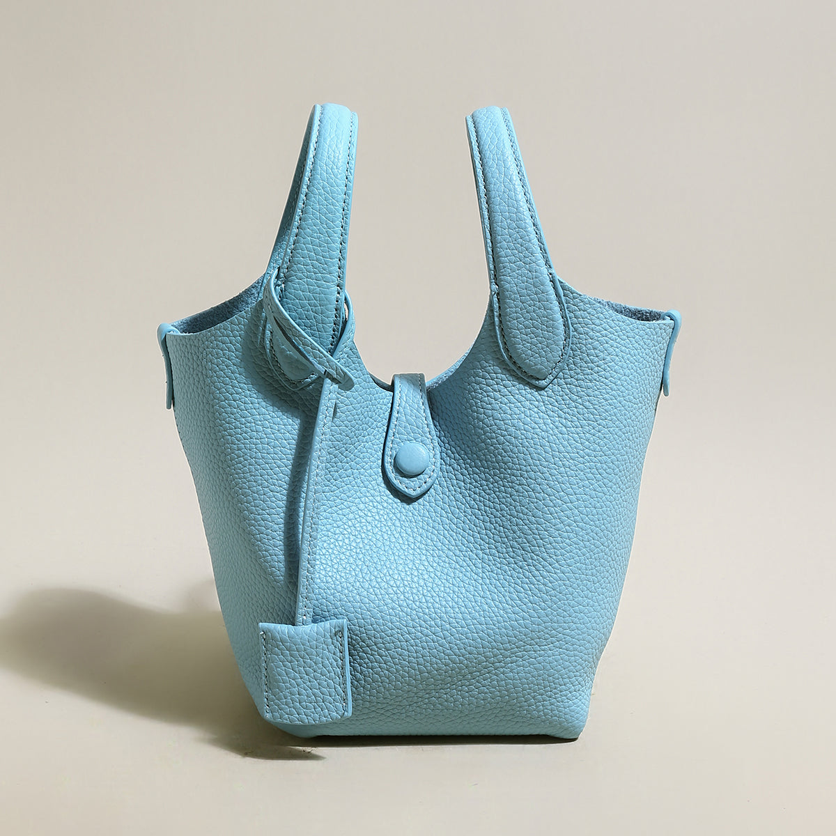 playful leather bucket bag blue 1