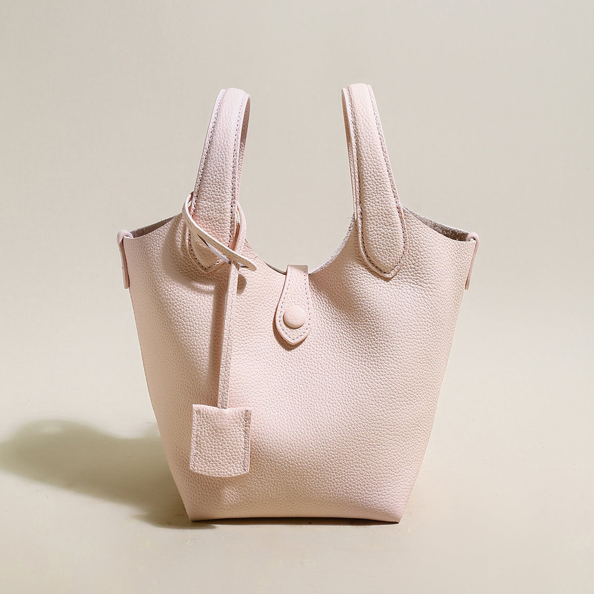 playful leather bucket bag pink 1
