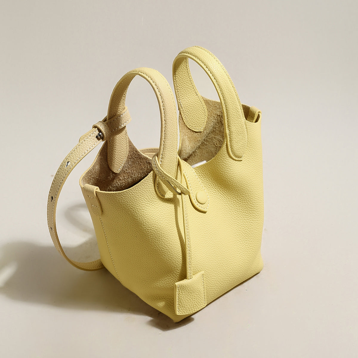 playful leather bucket bag yellow 2