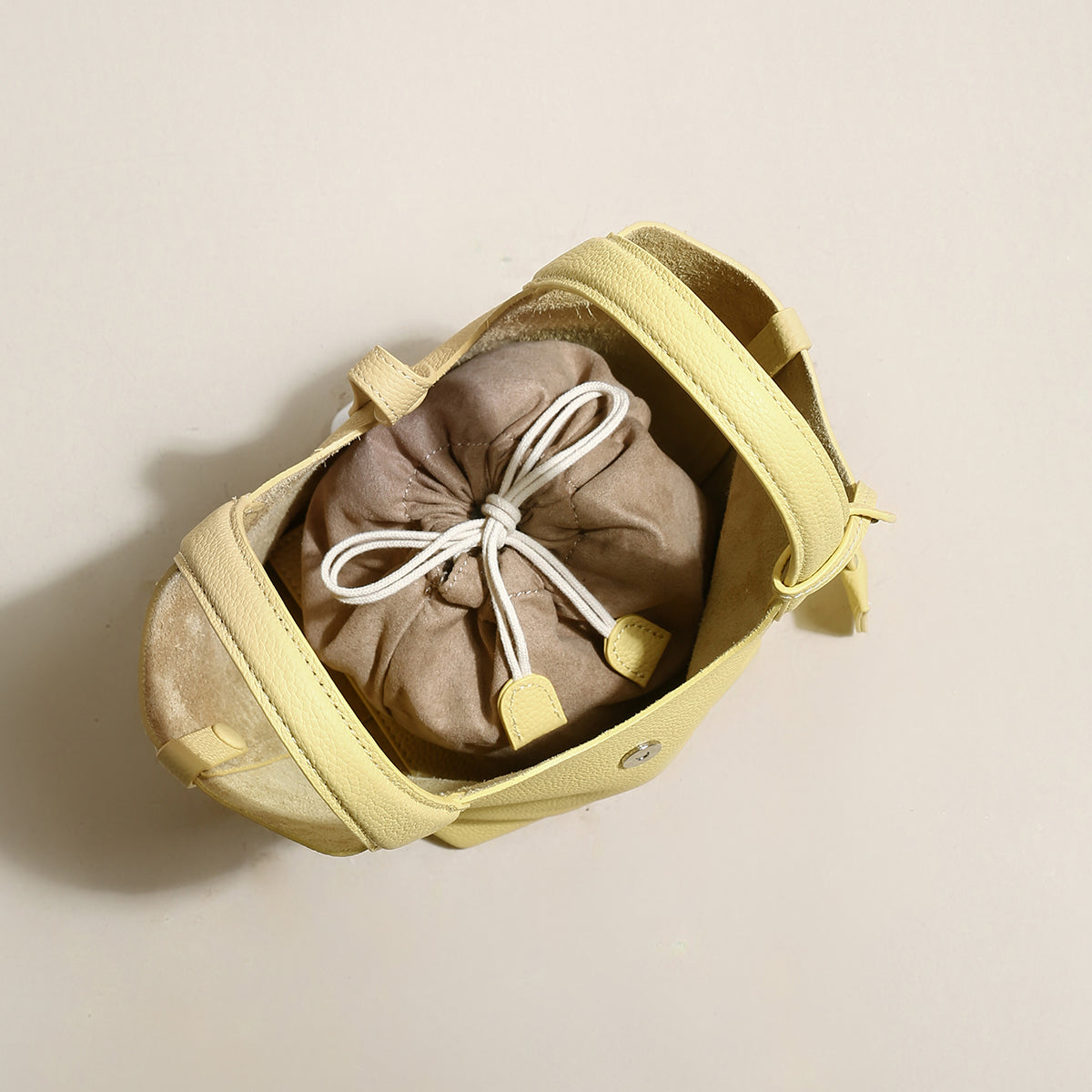 playful leather bucket bag yellow 3