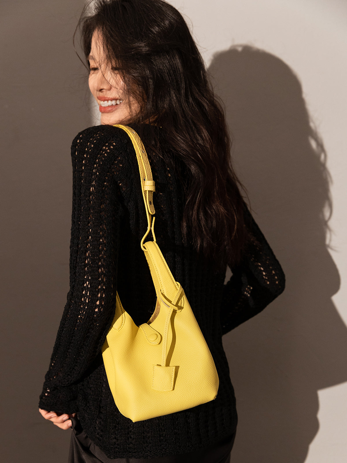 playful leather bucket bag yellow 6