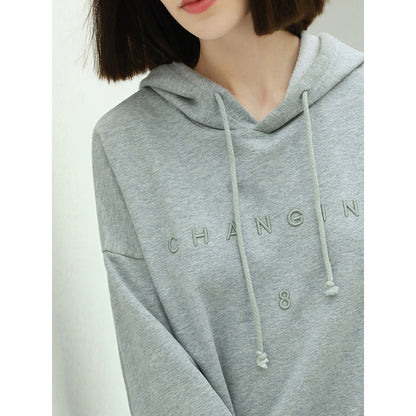 relaxed-fit-grey-hooded-sweater-with-slogan_all_grey_3.jpg