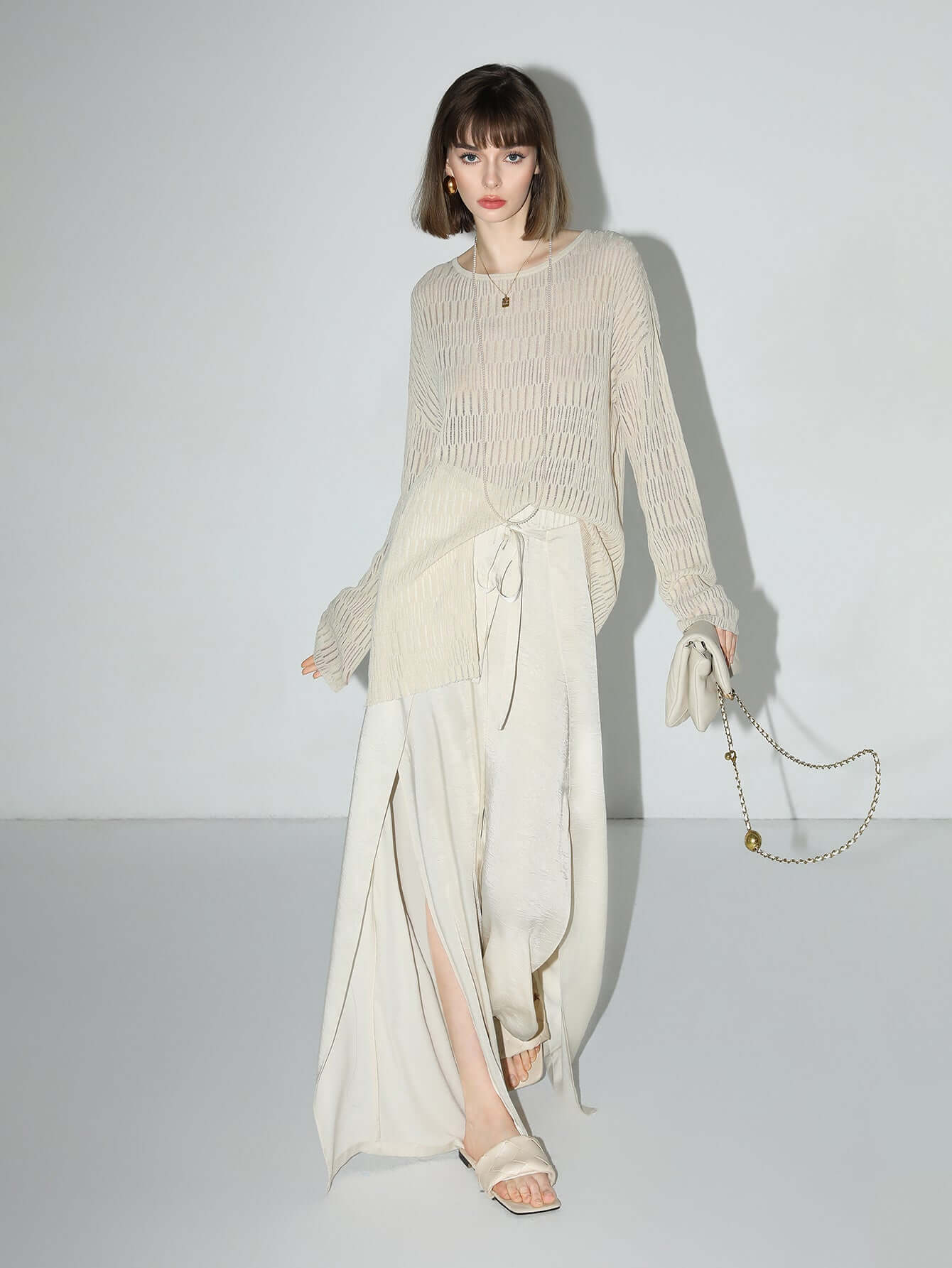 sheer knit top with asymmetrical hem all ivory 2