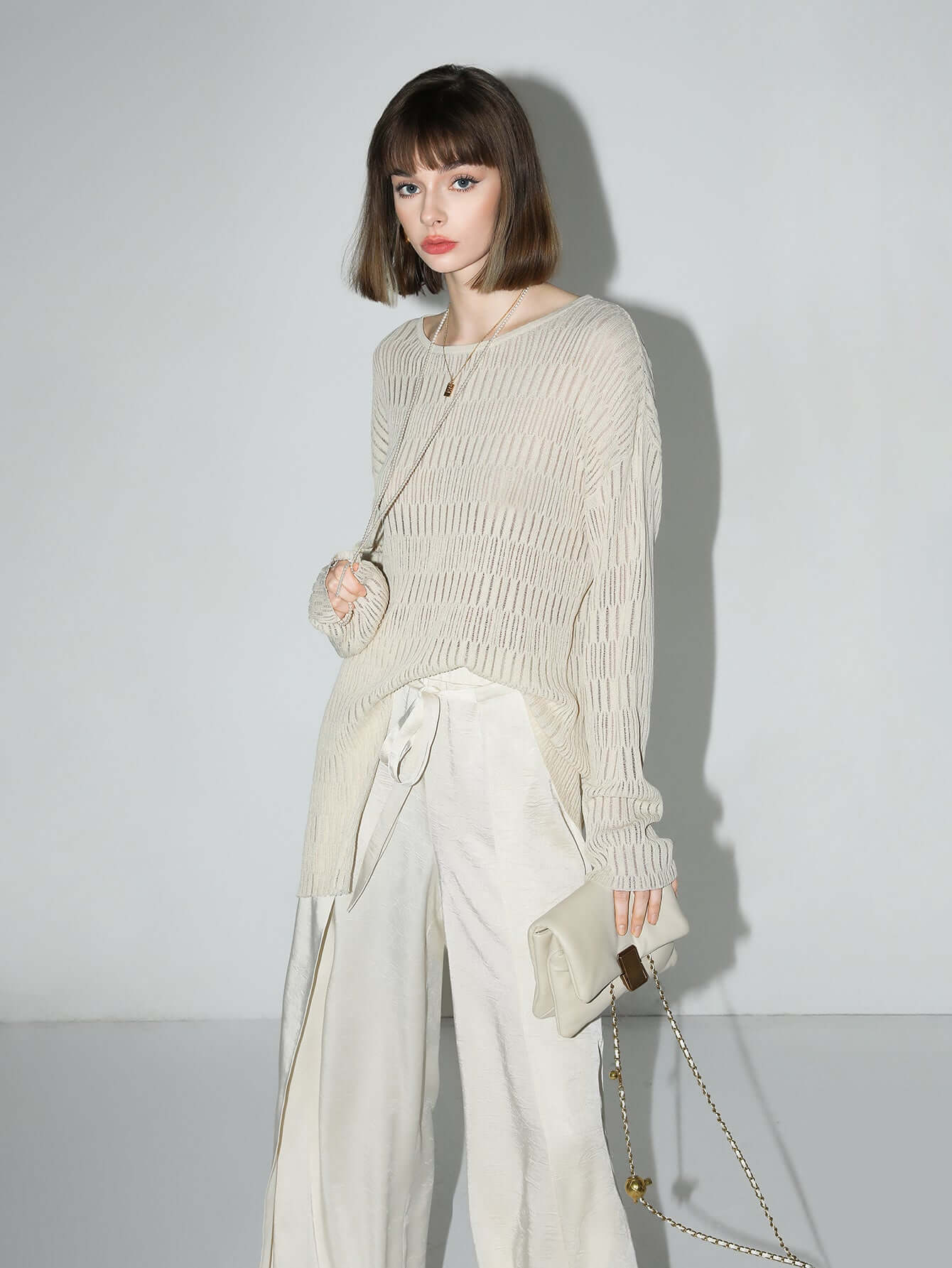 sheer knit top with asymmetrical hem all ivory 3