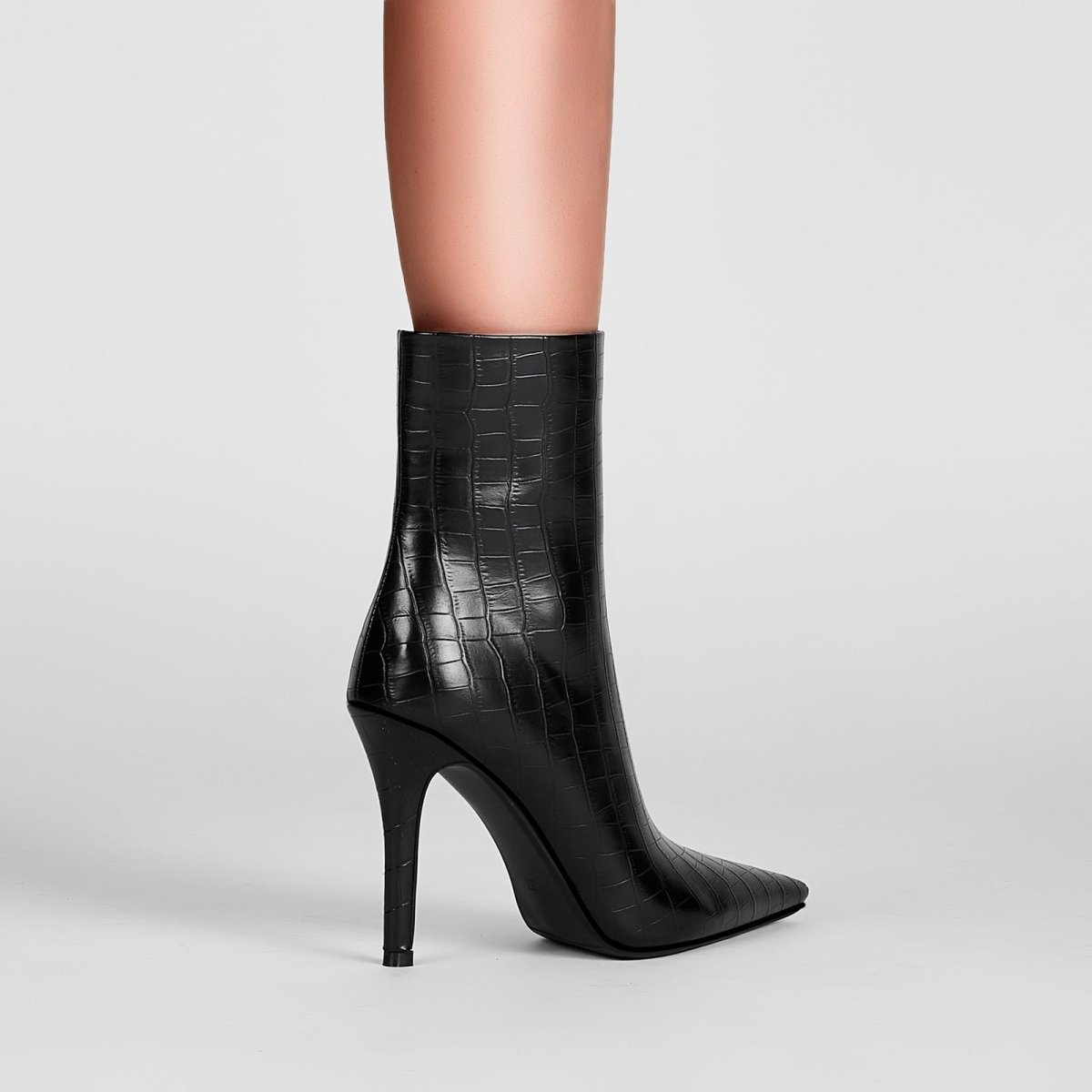 sleek - black - leather - pointed - ankle - boots_all_black_9.jpg