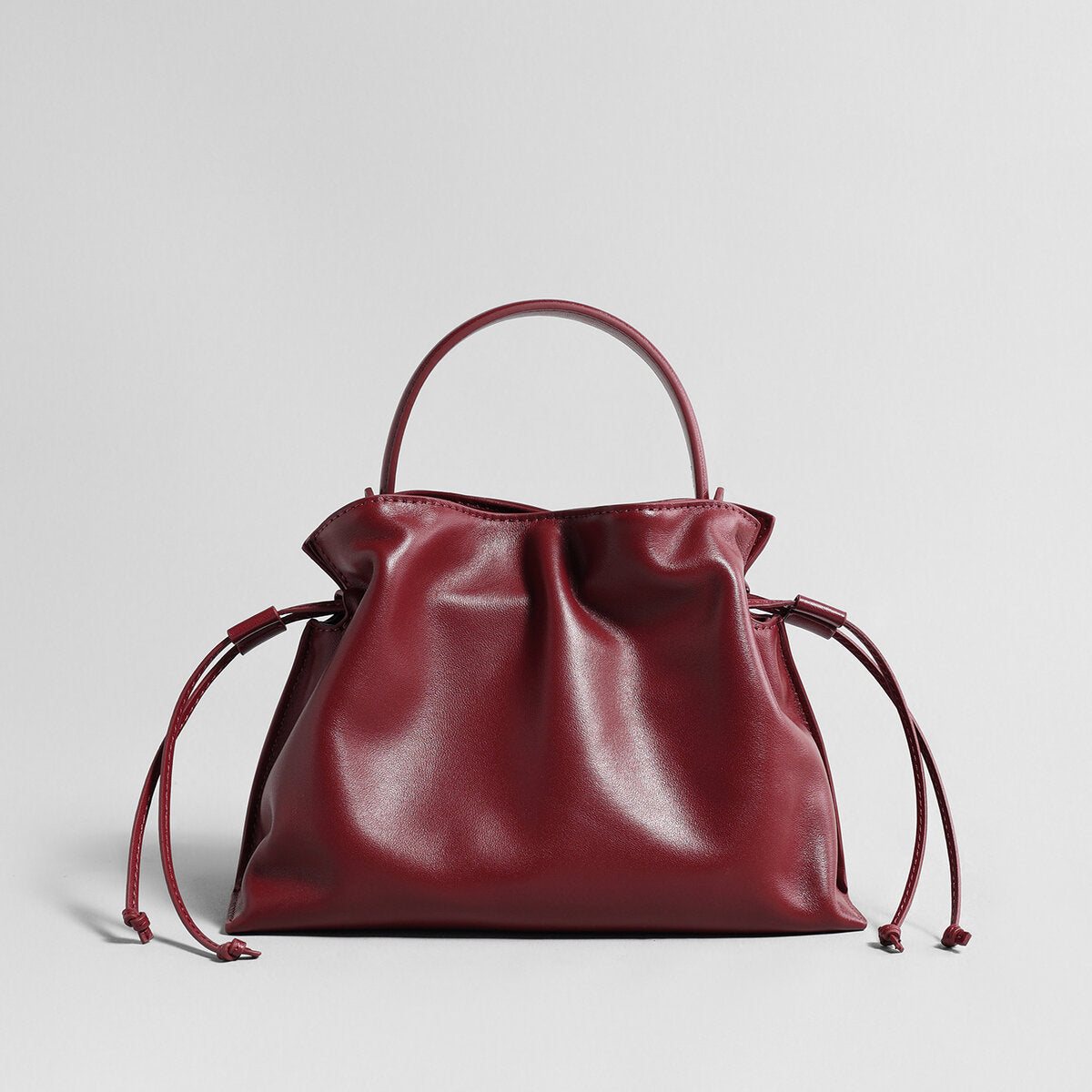 Soft Lambskin Leather Fortune Pouch Bag – Ruched Drawstring Design with Top Handle & Crossbody Strap