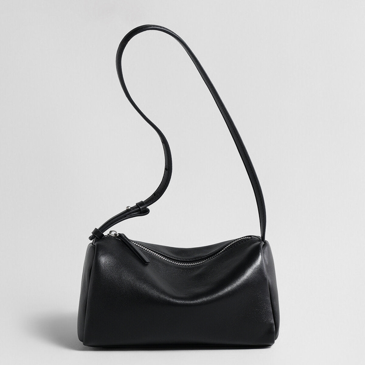 Soft Lambskin Leather Barrel Shoulder Bag – Curved-Zip Cylinder Design with Adjustable Crossbody Strap