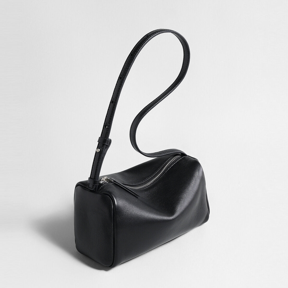 Soft Lambskin Leather Barrel Shoulder Bag – Curved-Zip Cylinder Design with Adjustable Crossbody Strap
