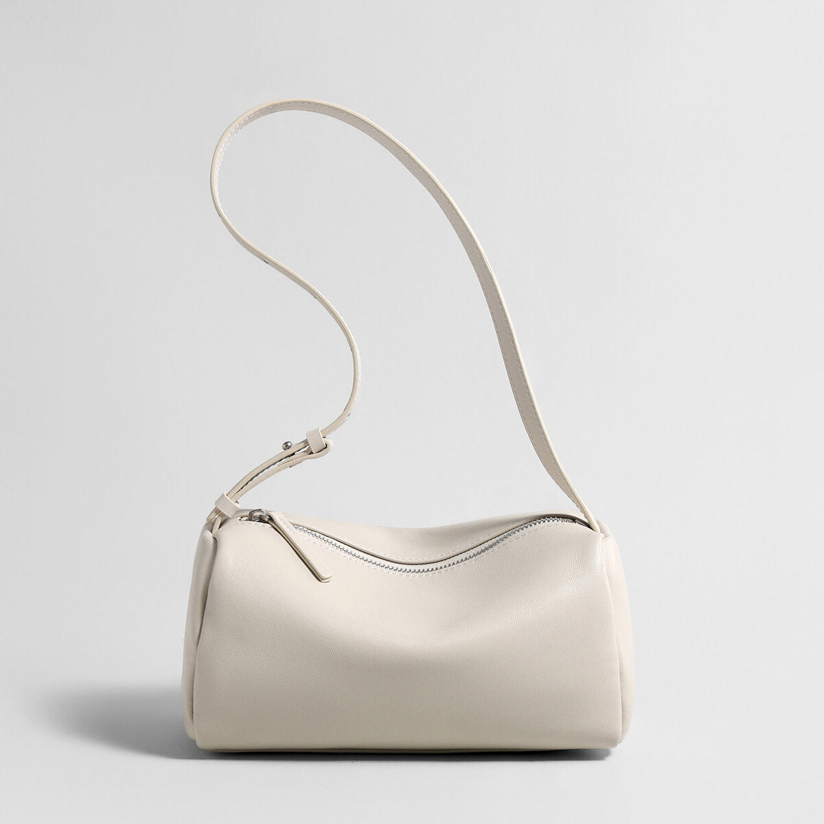 Soft Lambskin Leather Barrel Shoulder Bag – Curved-Zip Cylinder Design with Adjustable Crossbody Strap