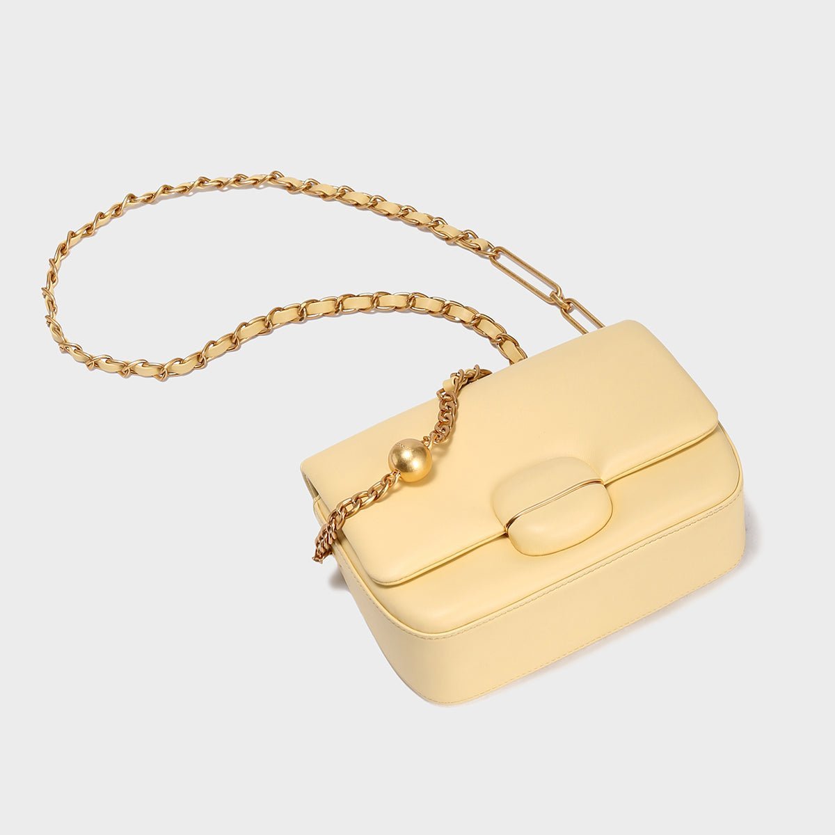 Structured Buckle Leather Shoulder Bag – Sculptural Lambskin Flap Bag with Gold Chain Strap