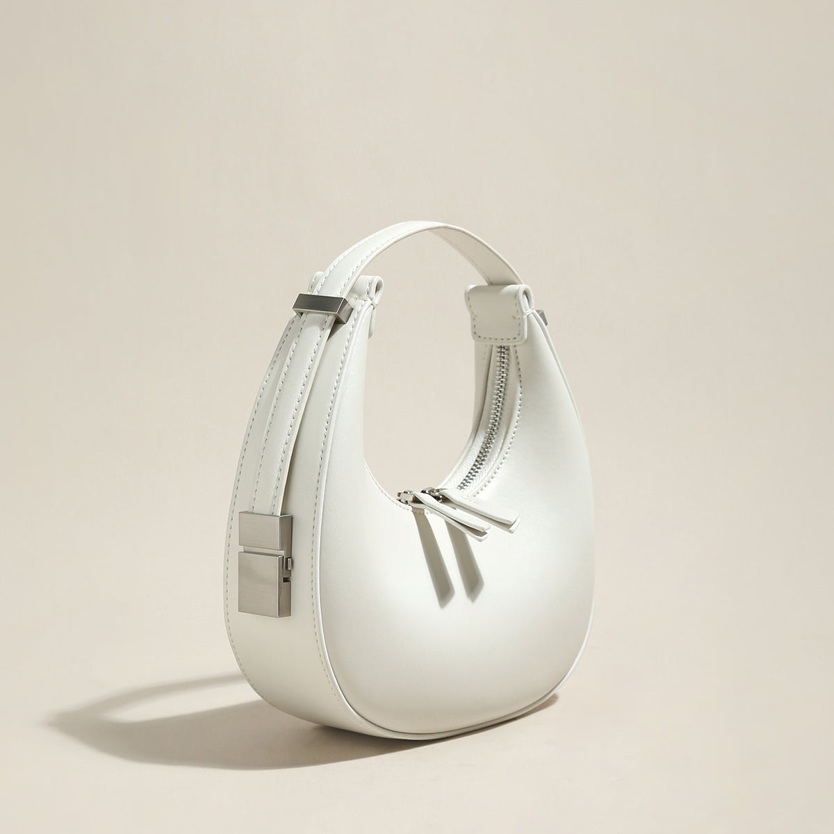 structured-leather-crescent-moon-bag_white_2.jpg