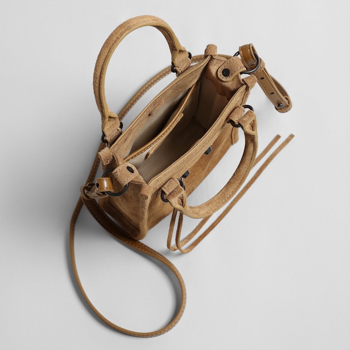 Suede Mini Moto Bag – Studded Top-Handle Crossbody Bag with Tassel