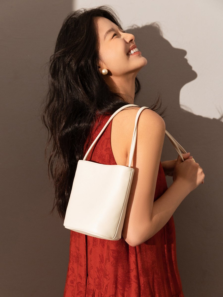 Thin Strap Waterproof Leather Bucket Bag – Minimalist Pebbled Leather Shoulder Bag with Knotted Detail