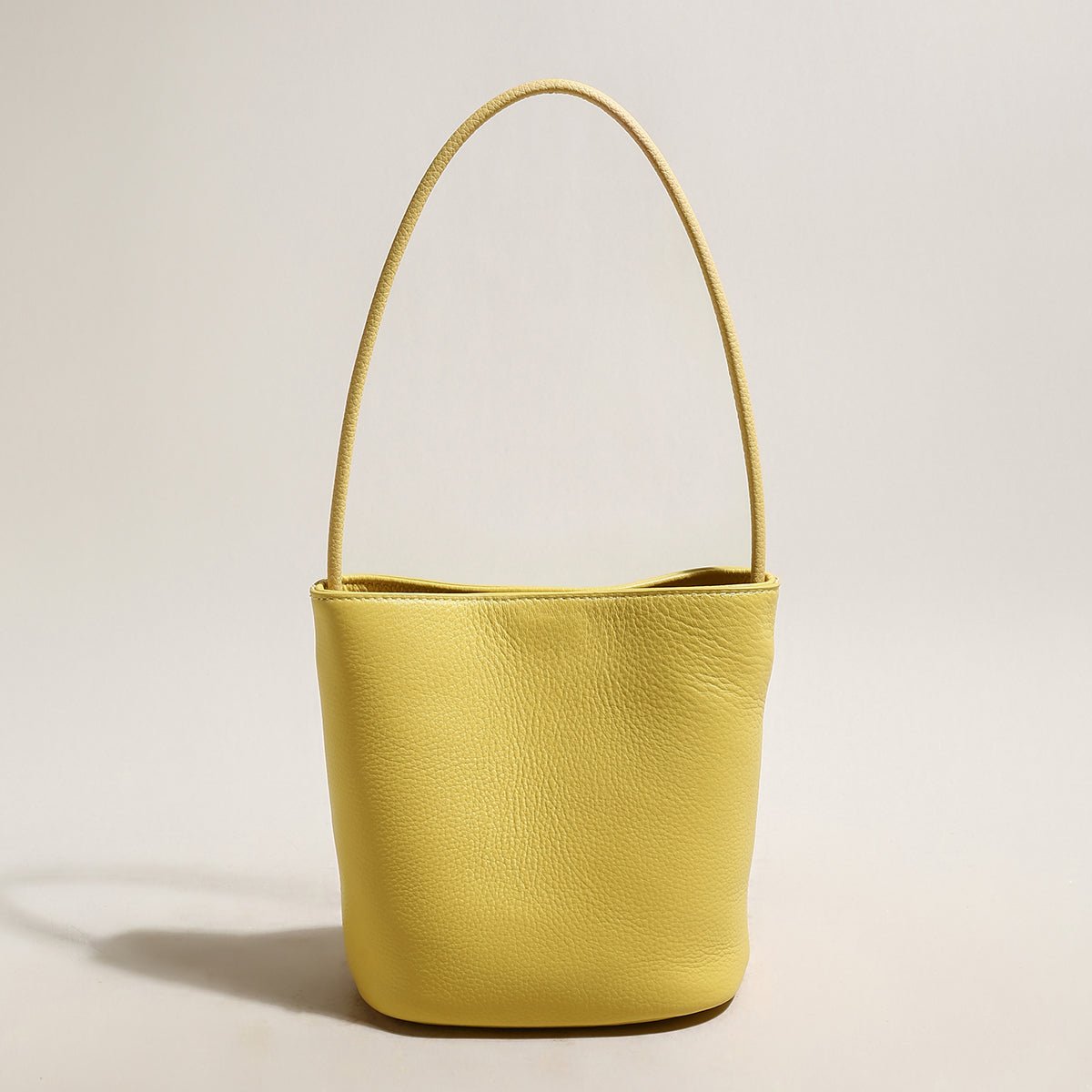 Thin Strap Waterproof Leather Bucket Bag – Minimalist Pebbled Leather Shoulder Bag with Knotted Detail