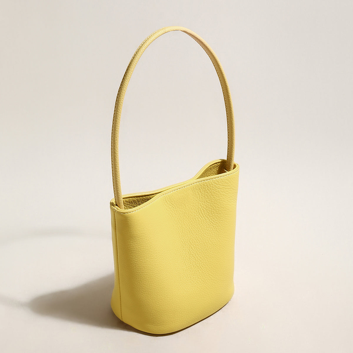 thin strap waterproof leather bucket bag yellow 2
