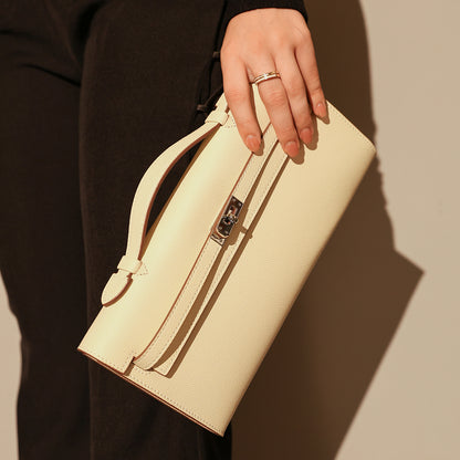 top-handle-leather-clutch-bag-with-silver-hardware_ivory_2.jpg