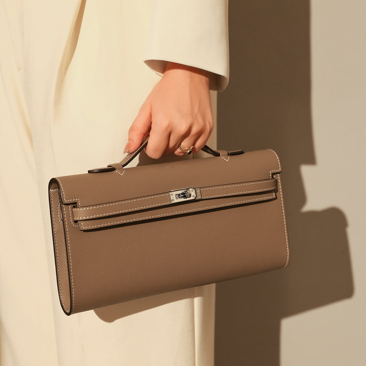 top-handle-leather-clutch-bag-with-silver-hardware_taupe_6.jpg