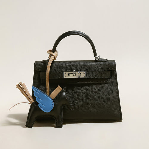 trendy petite top handle bag with a horse charm black 1