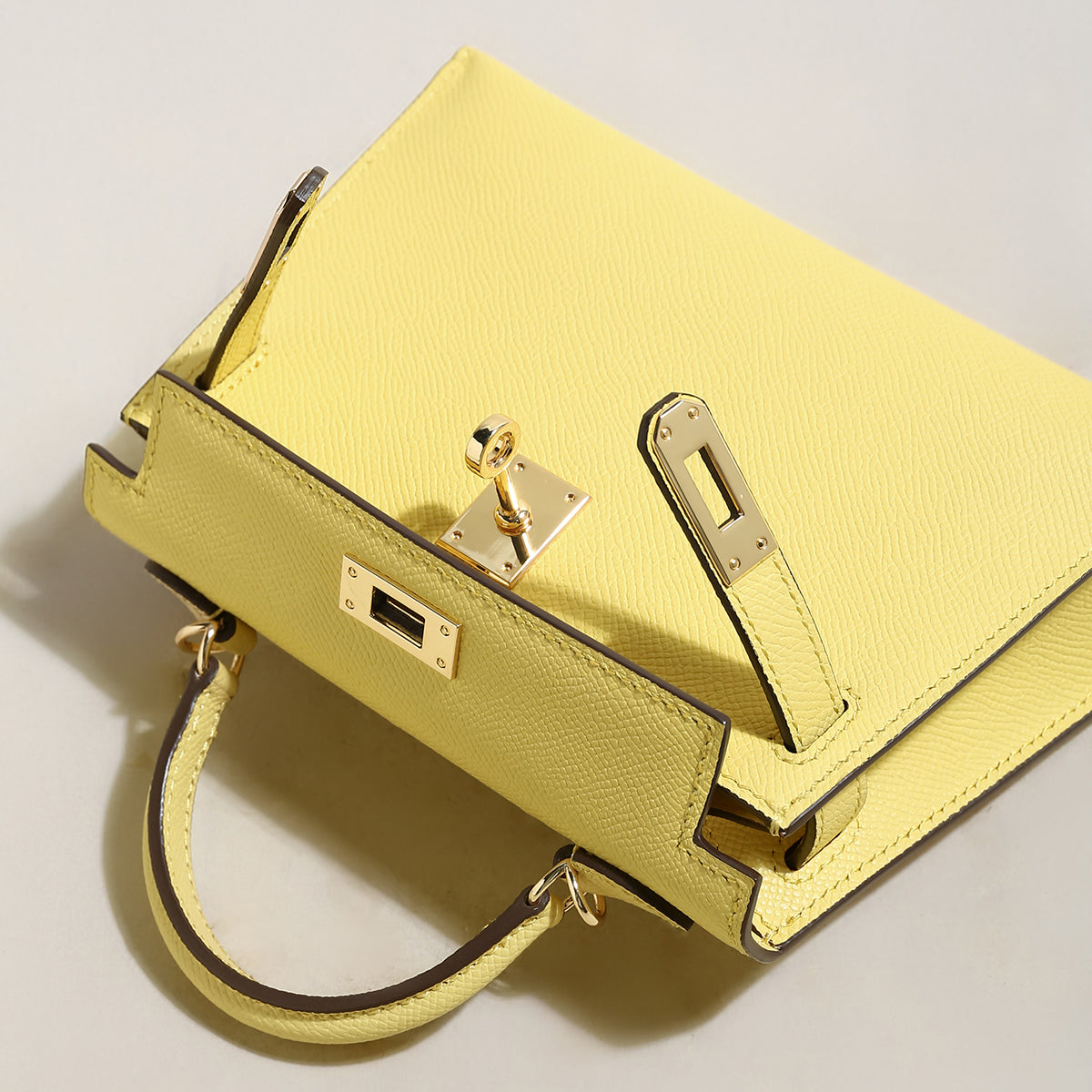 trendy-petite-top-handle-bag-with-a-horse-charm_yellow_3.jpg