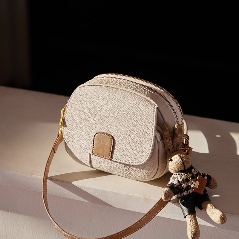 trendy rabbit charm round leather bag ivory 4