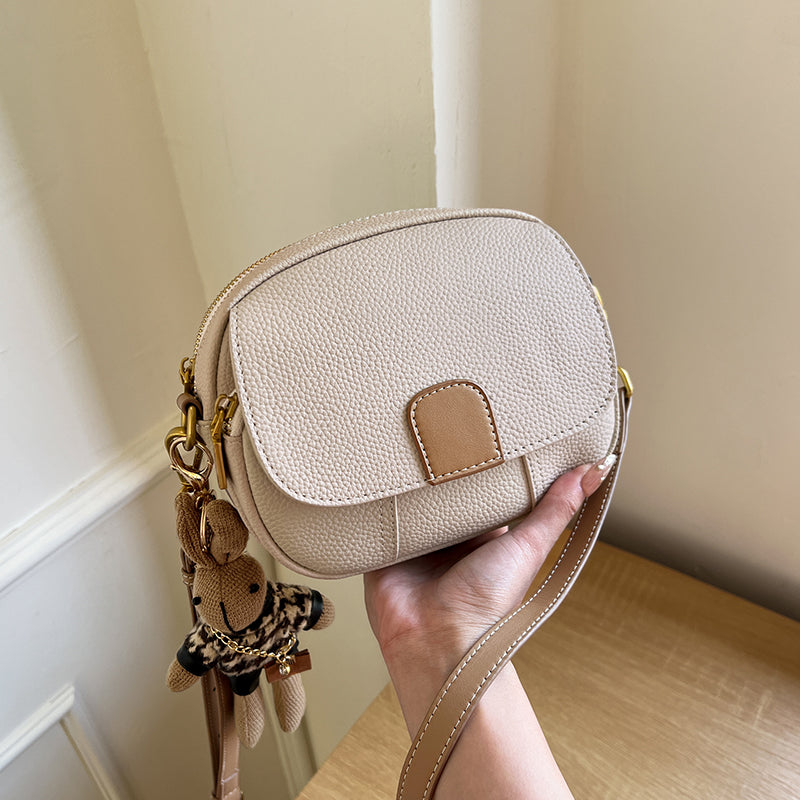 trendy rabbit charm round leather bag ivory 7