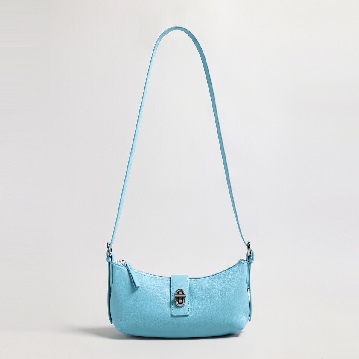 Turn-Lock Crescent Baguette Bag – Minimalist Leather Shoulder Purse