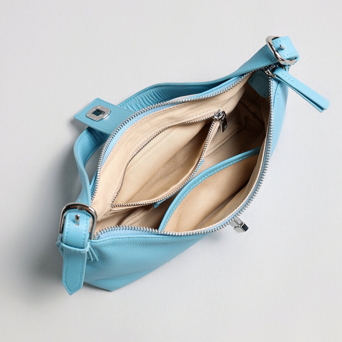 Turn-Lock Crescent Baguette Bag – Minimalist Leather Shoulder Purse