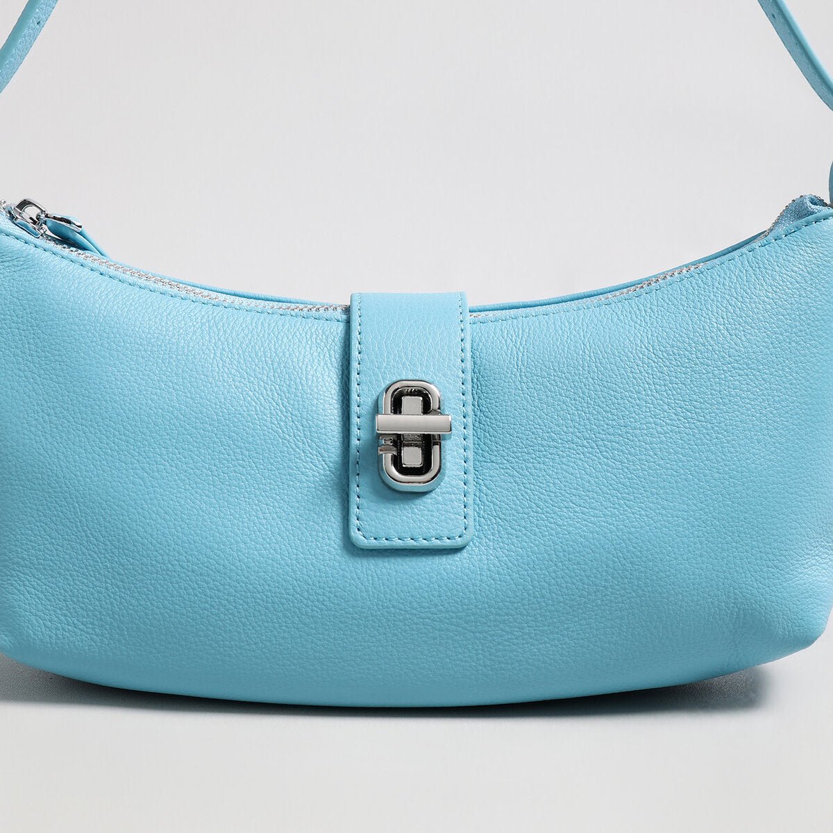 Turn-Lock Crescent Baguette Bag – Minimalist Leather Shoulder Purse