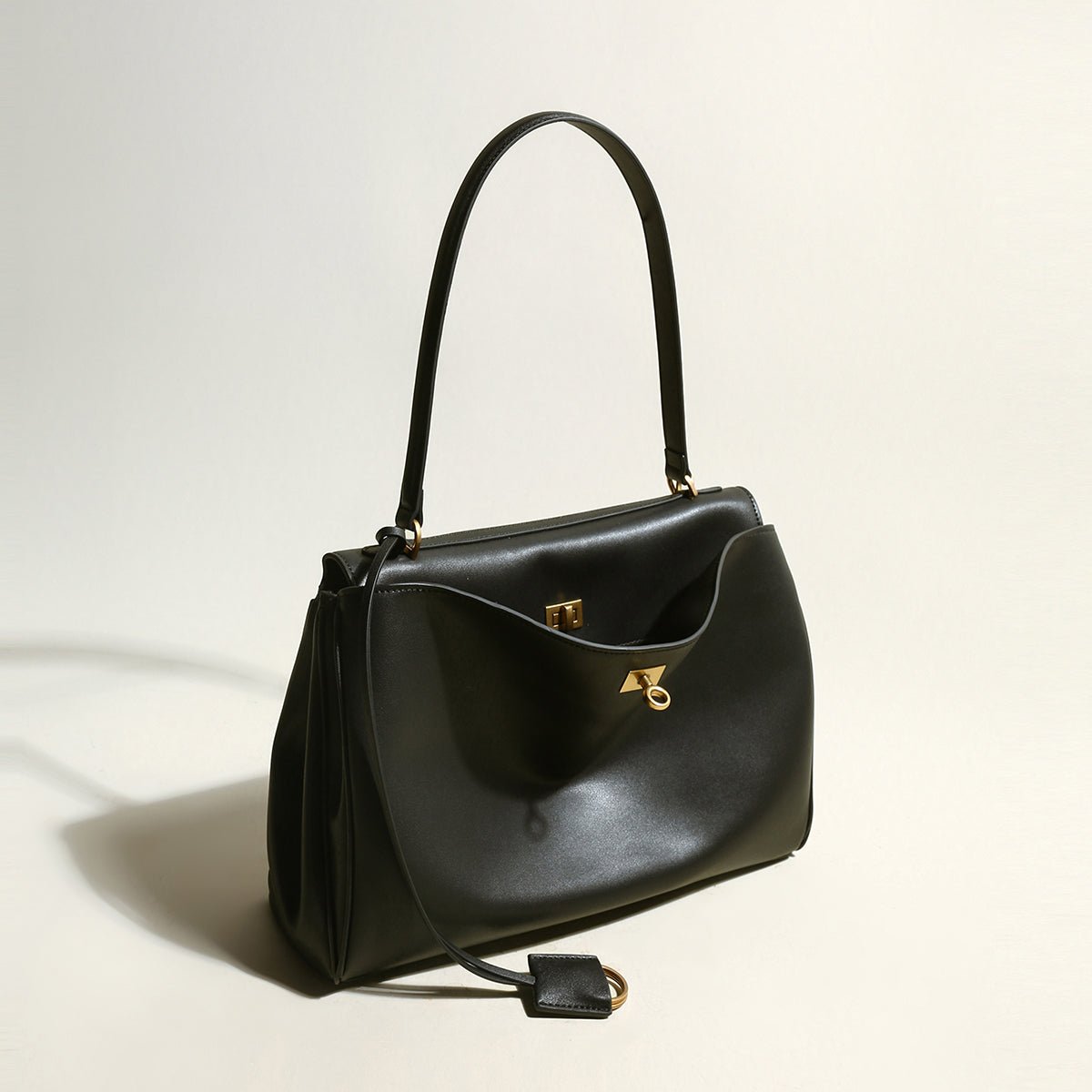 Utilitarian Structured Leather Flap Bag – Professional Top Handle Bag with Turn-Lock Closure