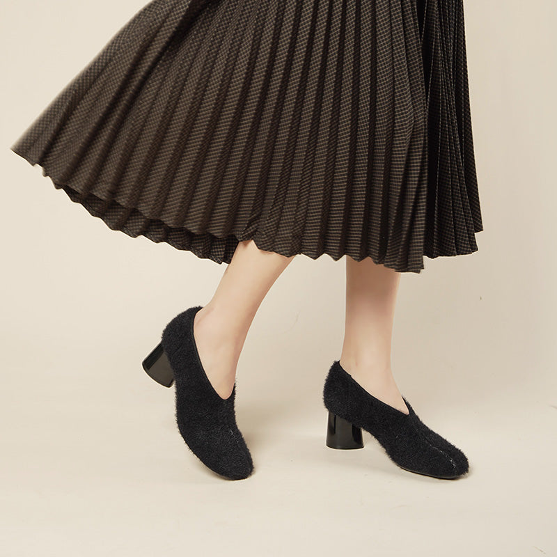 versatile round toe block heel fuzzy pumps all black 6
