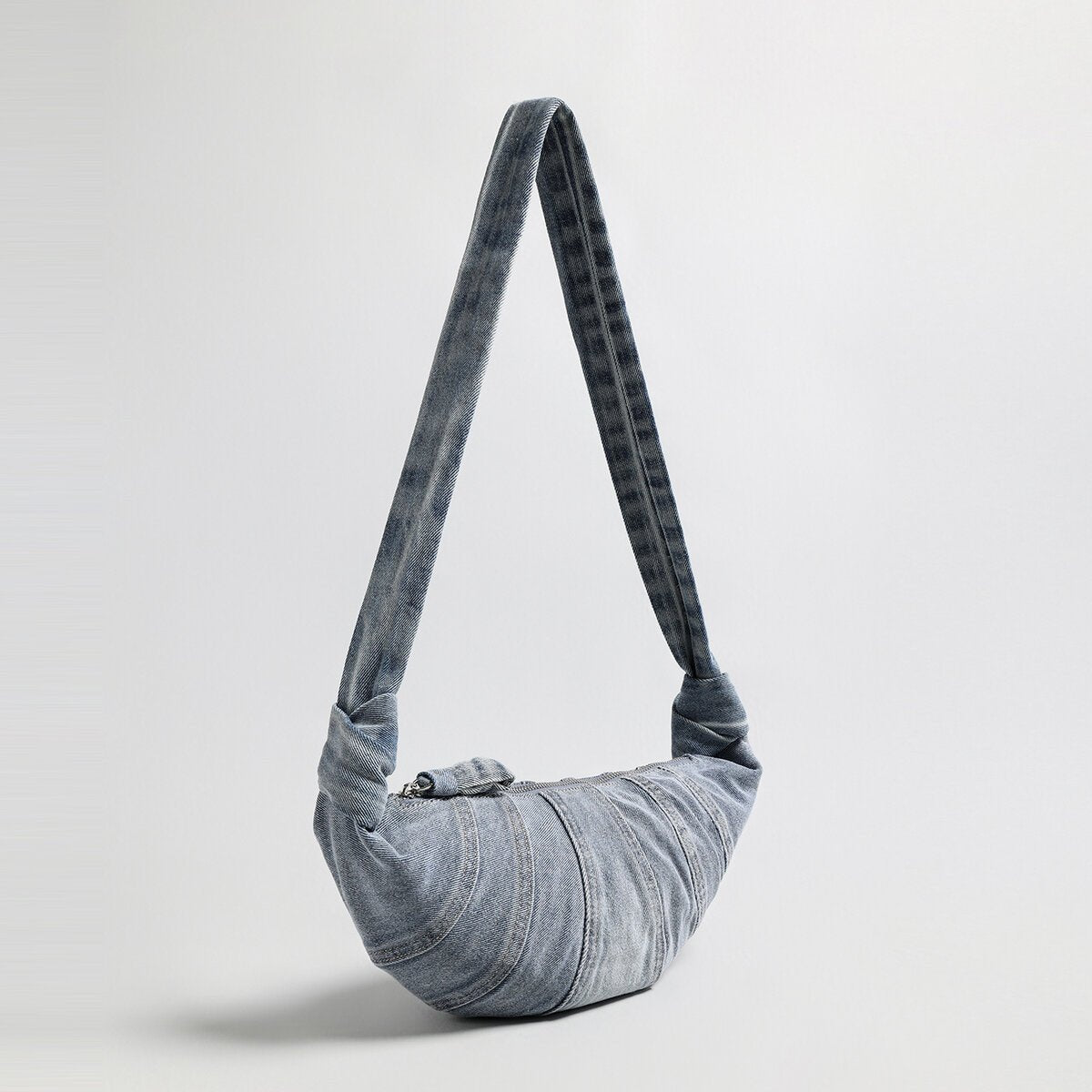 Washed Denim Croissant Shoulder Bag – Pleated Crescent Hobo with Knotted Strap Detail