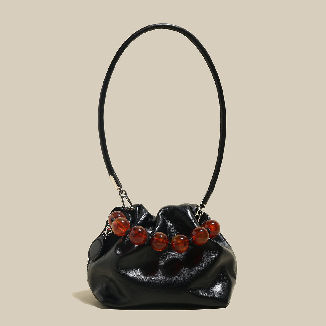 whimsical-pouch-bucket-bag-with-beaded-embellishments_black_1.jpg